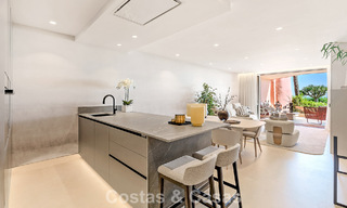 High quality renovated garden apartment with open sea views for sale, frontline beach between Marbella and Estepona 783430 