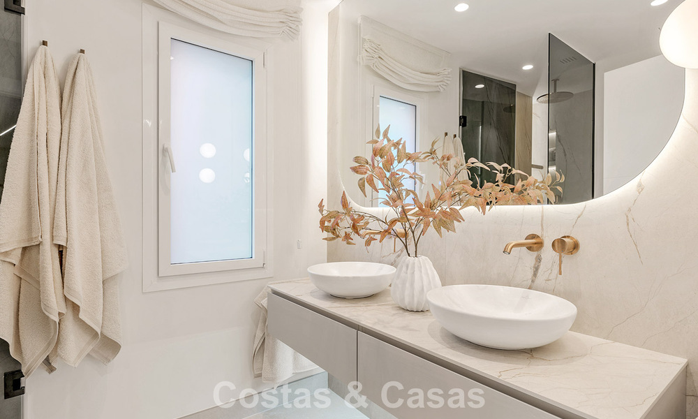 High quality renovated garden apartment with open sea views for sale, frontline beach between Marbella and Estepona 783432
