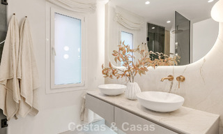 High quality renovated garden apartment with open sea views for sale, frontline beach between Marbella and Estepona 783432 