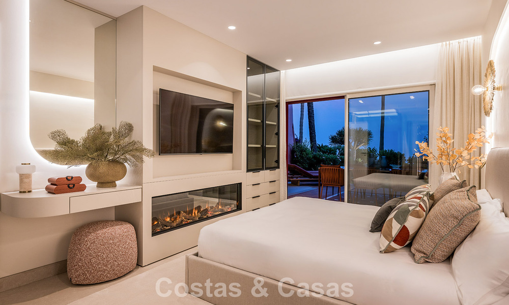 High quality renovated garden apartment with open sea views for sale, frontline beach between Marbella and Estepona 783442