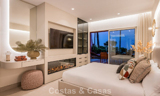 High quality renovated garden apartment with open sea views for sale, frontline beach between Marbella and Estepona 783442 