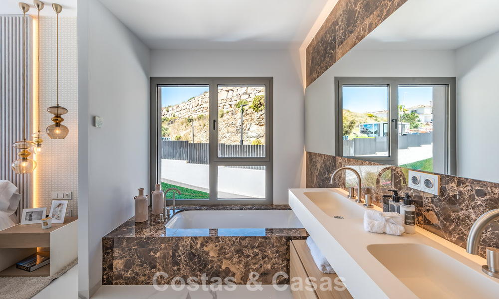 Sophisticated apartment with panoramic sea views for sale in a gated boutique complex in the hills of Marbella - Benahavis 783497