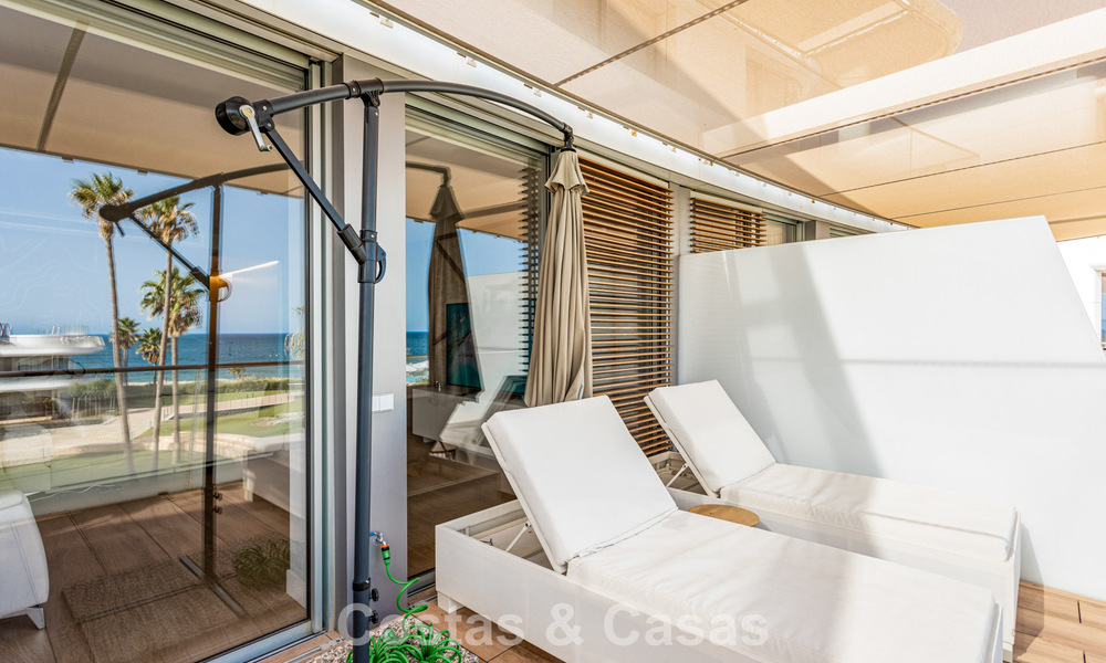 Modern 4 bedroom beachfront apartment for sale with sea views in Estepona, Costa del Sol 782693