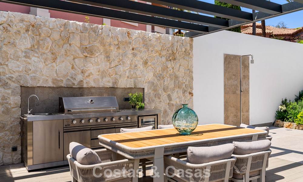 Frontline golf villa with golf and sea views for sale in the prestigious 5* golf resort in Marbella - Benahavis 783364