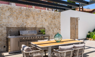 Frontline golf villa with golf and sea views for sale in the prestigious 5* golf resort in Marbella - Benahavis 783364 
