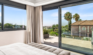 Frontline golf villa with golf and sea views for sale in the prestigious 5* golf resort in Marbella - Benahavis 783377 