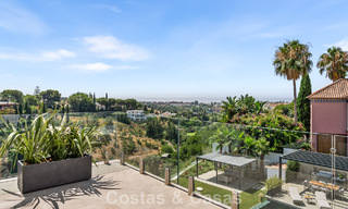 Frontline golf villa with golf and sea views for sale in the prestigious 5* golf resort in Marbella - Benahavis 783378 