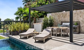 Frontline golf villa with golf and sea views for sale in the prestigious 5* golf resort in Marbella - Benahavis 783386 