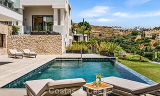 Frontline golf villa with golf and sea views for sale in the prestigious 5* golf resort in Marbella - Benahavis 783388 