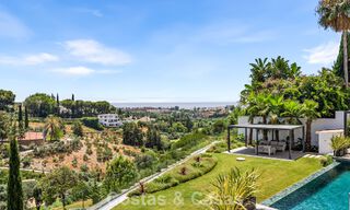 Frontline golf villa with golf and sea views for sale in the prestigious 5* golf resort in Marbella - Benahavis 783390 
