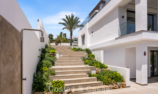 Frontline golf villa with golf and sea views for sale in the prestigious 5* golf resort in Marbella - Benahavis 783391 