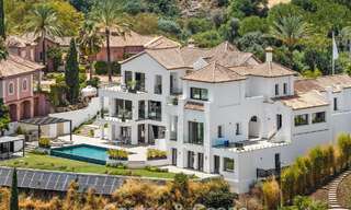 Frontline golf villa with golf and sea views for sale in the prestigious 5* golf resort in Marbella - Benahavis 783394 