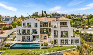 Frontline golf villa with golf and sea views for sale in the prestigious 5* golf resort in Marbella - Benahavis 783395 