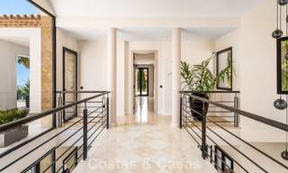 Frontline golf villa with golf and sea views for sale in the prestigious 5* golf resort in Marbella - Benahavis 783396 