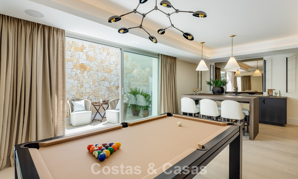Impressive luxury villa with grass tennis court for sale close to all amenities on Marbella's renowned Golden Mile 782696