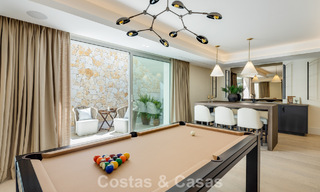 Impressive luxury villa with grass tennis court for sale close to all amenities on Marbella's renowned Golden Mile 782696 
