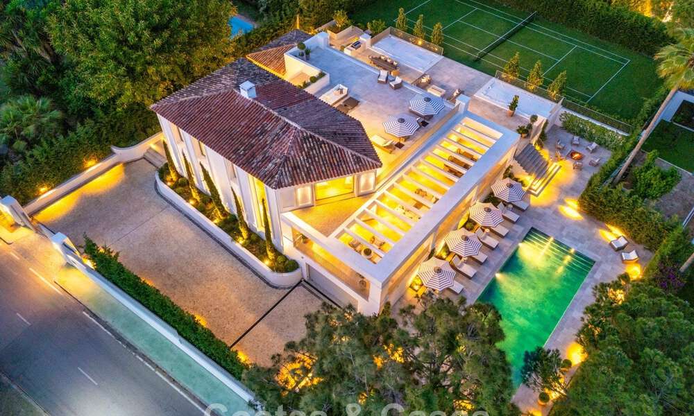 Impressive luxury villa with grass tennis court for sale close to all amenities on Marbella's renowned Golden Mile 782697