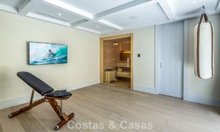 Impressive luxury villa with grass tennis court for sale close to all amenities on Marbella's renowned Golden Mile 782700 