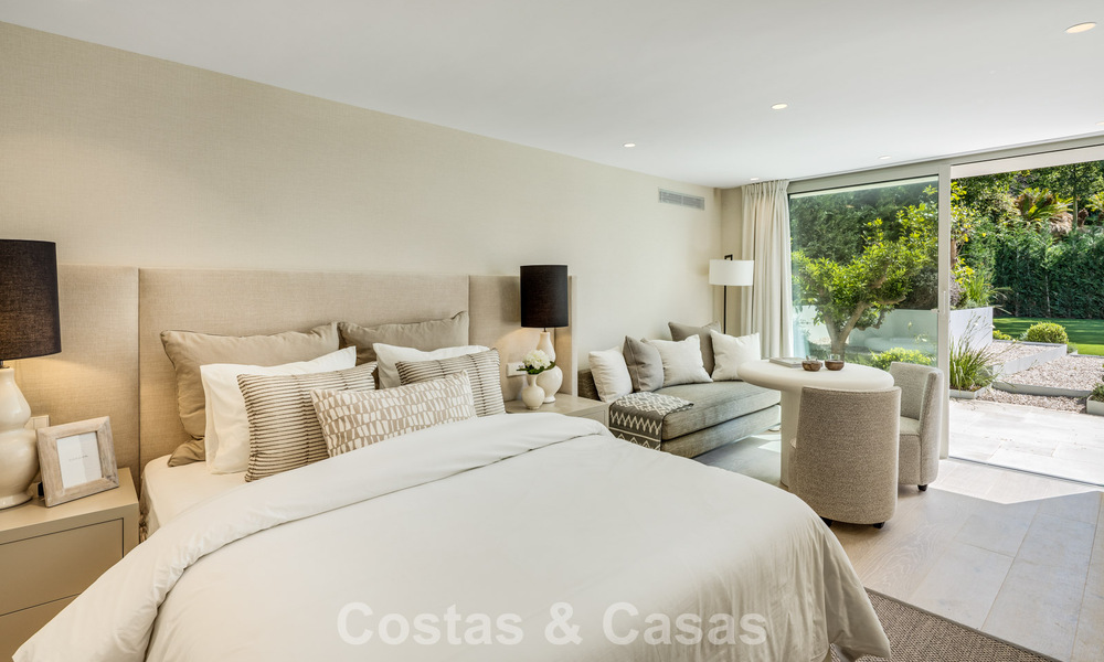 Impressive luxury villa with grass tennis court for sale close to all amenities on Marbella's renowned Golden Mile 782701