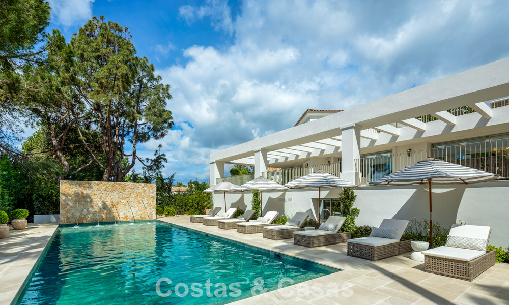 Impressive luxury villa with grass tennis court for sale close to all amenities on Marbella's renowned Golden Mile 782703