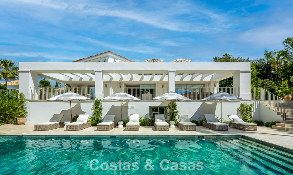 Impressive luxury villa with grass tennis court for sale close to all amenities on Marbella's renowned Golden Mile 782704