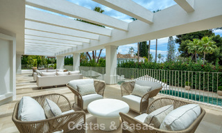 Impressive luxury villa with grass tennis court for sale close to all amenities on Marbella's renowned Golden Mile 782705 