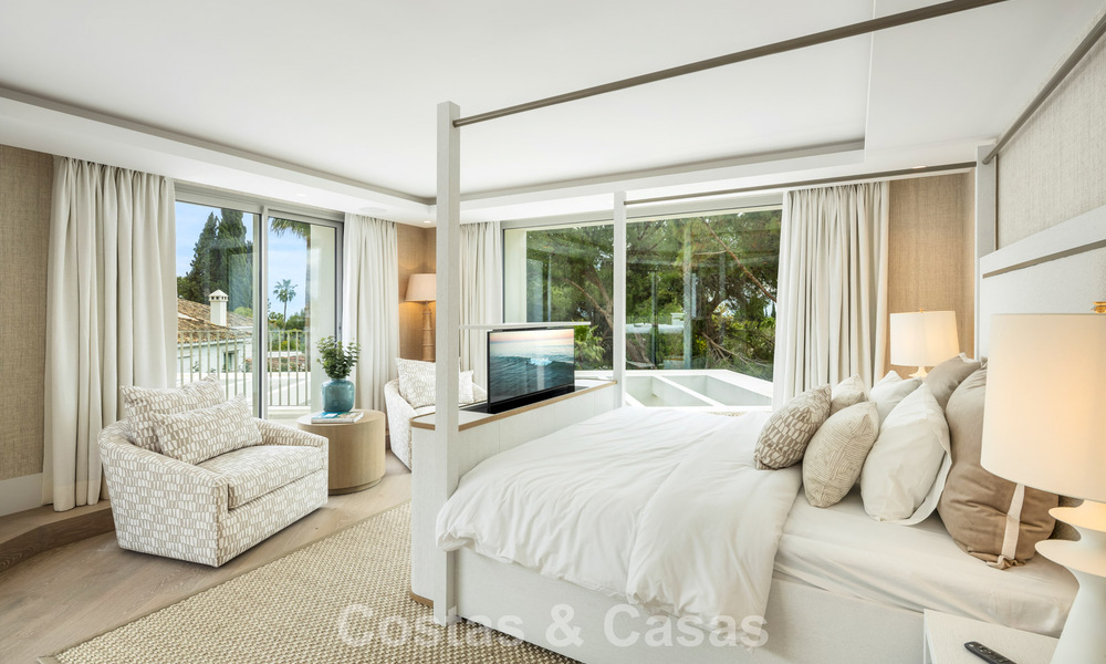 Impressive luxury villa with grass tennis court for sale close to all amenities on Marbella's renowned Golden Mile 782712