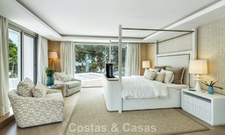 Impressive luxury villa with grass tennis court for sale close to all amenities on Marbella's renowned Golden Mile 782713 
