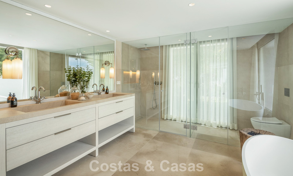 Impressive luxury villa with grass tennis court for sale close to all amenities on Marbella's renowned Golden Mile 782715