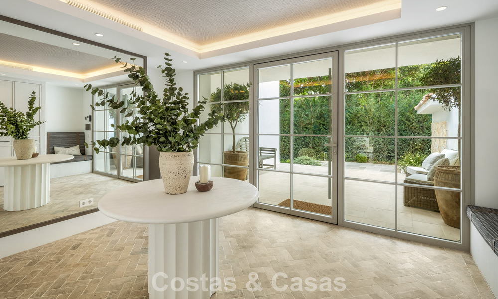 Impressive luxury villa with grass tennis court for sale close to all amenities on Marbella's renowned Golden Mile 782719