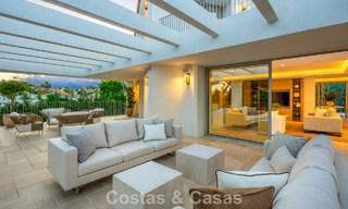 Impressive luxury villa with grass tennis court for sale close to all amenities on Marbella's renowned Golden Mile 782720 