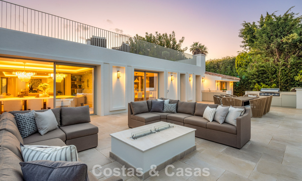 Impressive luxury villa with grass tennis court for sale close to all amenities on Marbella's renowned Golden Mile 782721