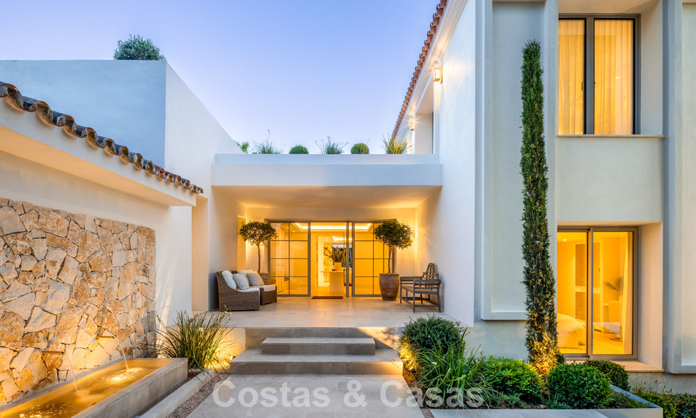 Impressive luxury villa with grass tennis court for sale close to all amenities on Marbella's renowned Golden Mile 782722