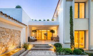 Impressive luxury villa with grass tennis court for sale close to all amenities on Marbella's renowned Golden Mile 782722 