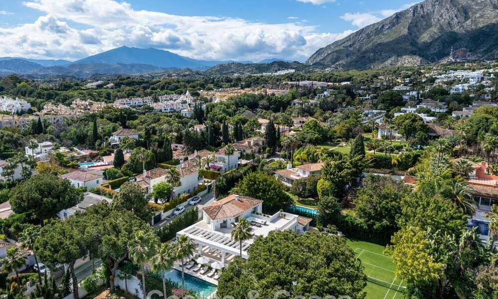 Impressive luxury villa with grass tennis court for sale close to all amenities on Marbella's renowned Golden Mile 782725