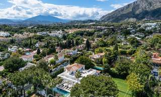 Impressive luxury villa with grass tennis court for sale close to all amenities on Marbella's renowned Golden Mile 782725 