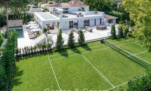 Impressive luxury villa with grass tennis court for sale close to all amenities on Marbella's renowned Golden Mile 782726
