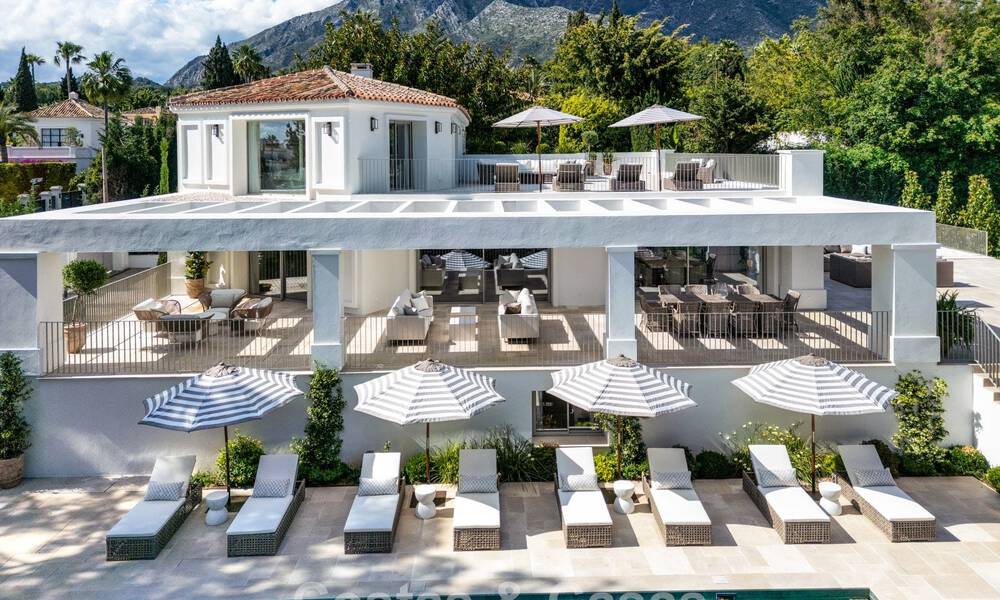 Impressive luxury villa with grass tennis court for sale close to all amenities on Marbella's renowned Golden Mile 782727