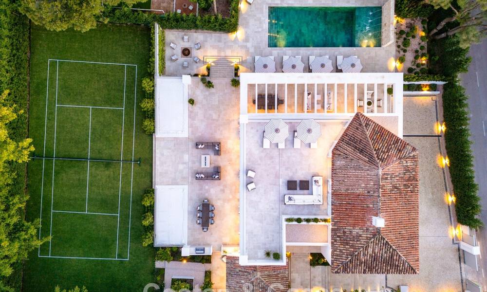 Impressive luxury villa with grass tennis court for sale close to all amenities on Marbella's renowned Golden Mile 782728