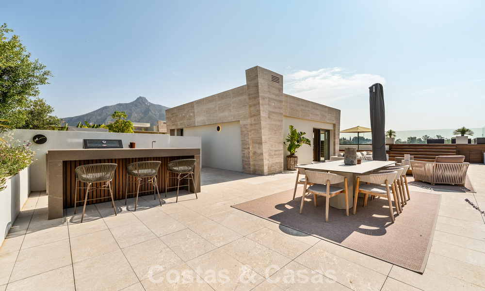 Move-in ready, high-end designer home for sale in a prime resort-style complex on Marbella's Golden Mile 782774