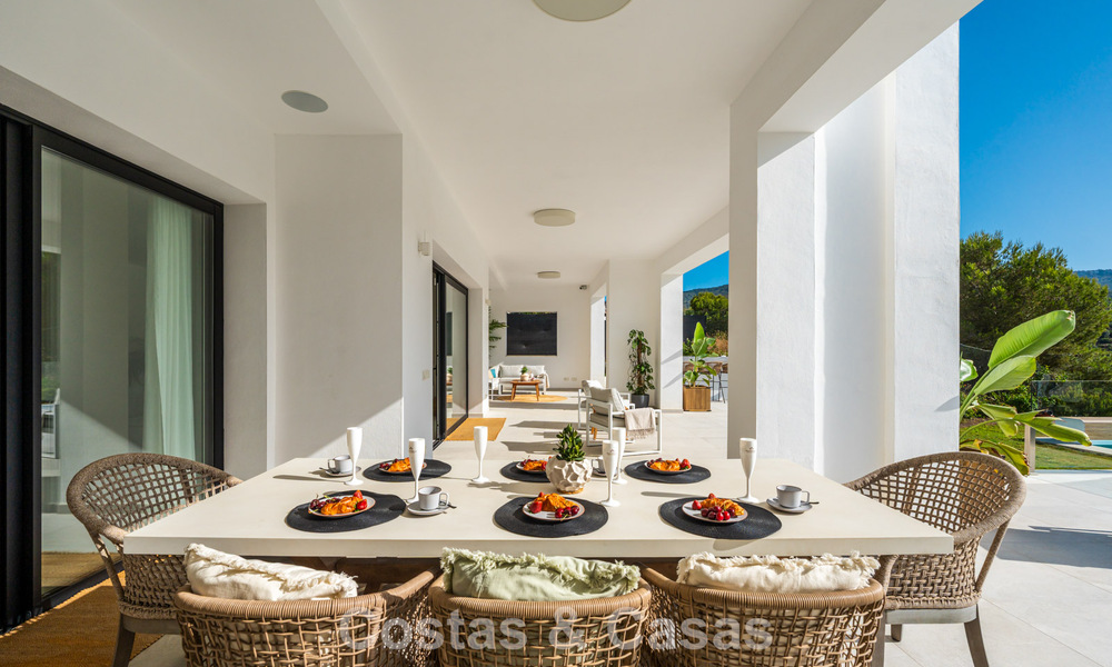 Frontline golf villa in a modern Mediterranean style for sale in Elviria, east of Marbella center 783007