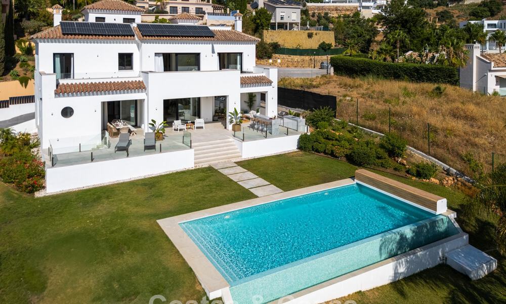 Frontline golf villa in a modern Mediterranean style for sale in Elviria, east of Marbella center 783014