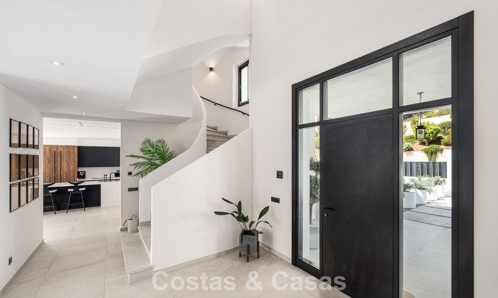 Frontline golf villa in a modern Mediterranean style for sale in Elviria, east of Marbella center 783021