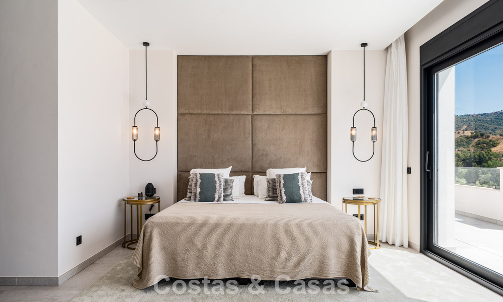 Frontline golf villa in a modern Mediterranean style for sale in Elviria, east of Marbella center 783024