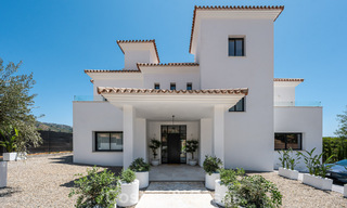 Frontline golf villa in a modern Mediterranean style for sale in Elviria, east of Marbella center 783029 