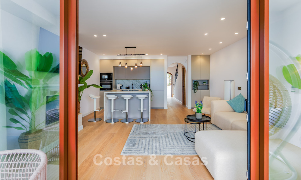 Move-in ready, spacious 3-bedroom townhouse for sale with contemporary interior and sea views in Marbella - Benahavis 782985