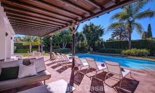 Luxury Mediterranean-style villa for sale within walking distance of the beach and amenities in Guadalmina Baja, Marbella 783101 
