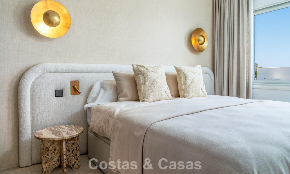 Modernly renovated apartment with stunning sea views for sale just steps from the beach on Marbella's Golden Mile 783792