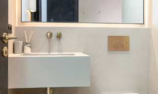 Modernly renovated apartment with stunning sea views for sale just steps from the beach on Marbella's Golden Mile 783810 