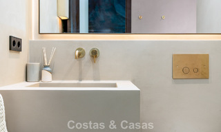 Modernly renovated apartment with stunning sea views for sale just steps from the beach on Marbella's Golden Mile 783811 